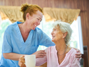 old lady with dementia and her caregiver